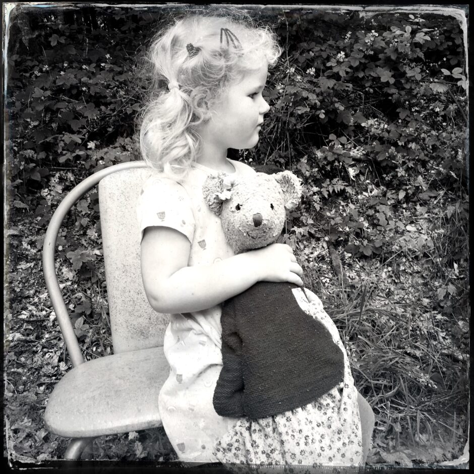 child, stuffed animal